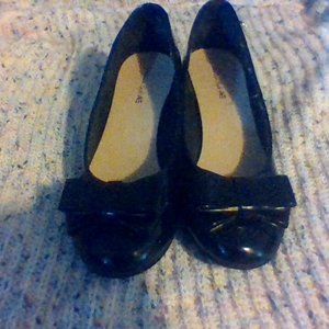 a pair of dressing shoes